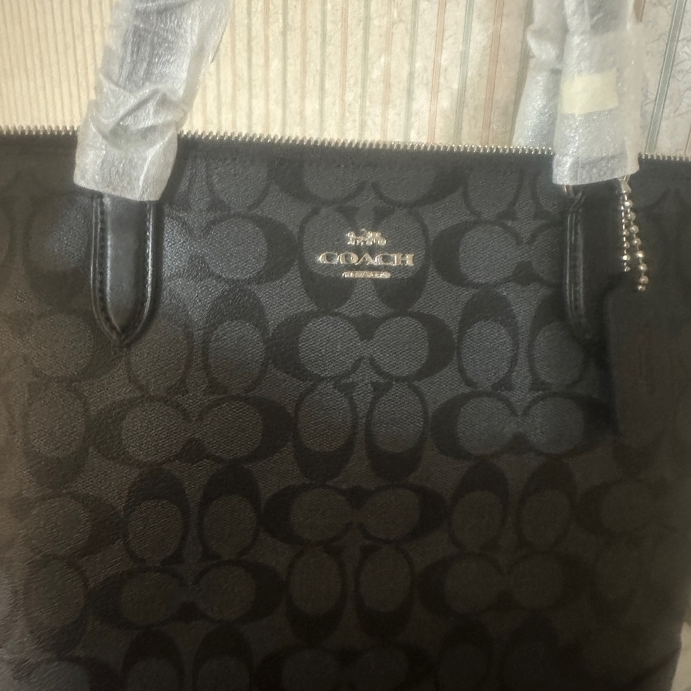 Brand new Coach bag purchased in November as a Christmas gift to myself .